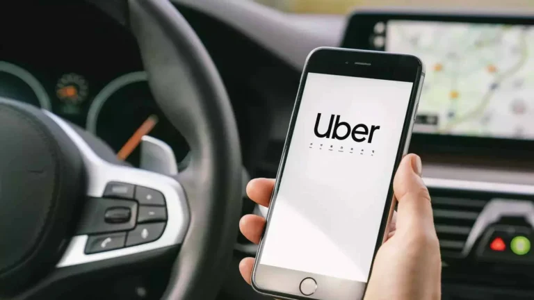 Uber India, FY24 earnings, revenue growth, Uber net loss, Uber expansion, BluSmart acquisition