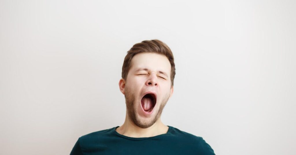 contagious yawning, yawning and empathy, evolution of yawning, autism and yawning, social behavior, brain science, human behavior