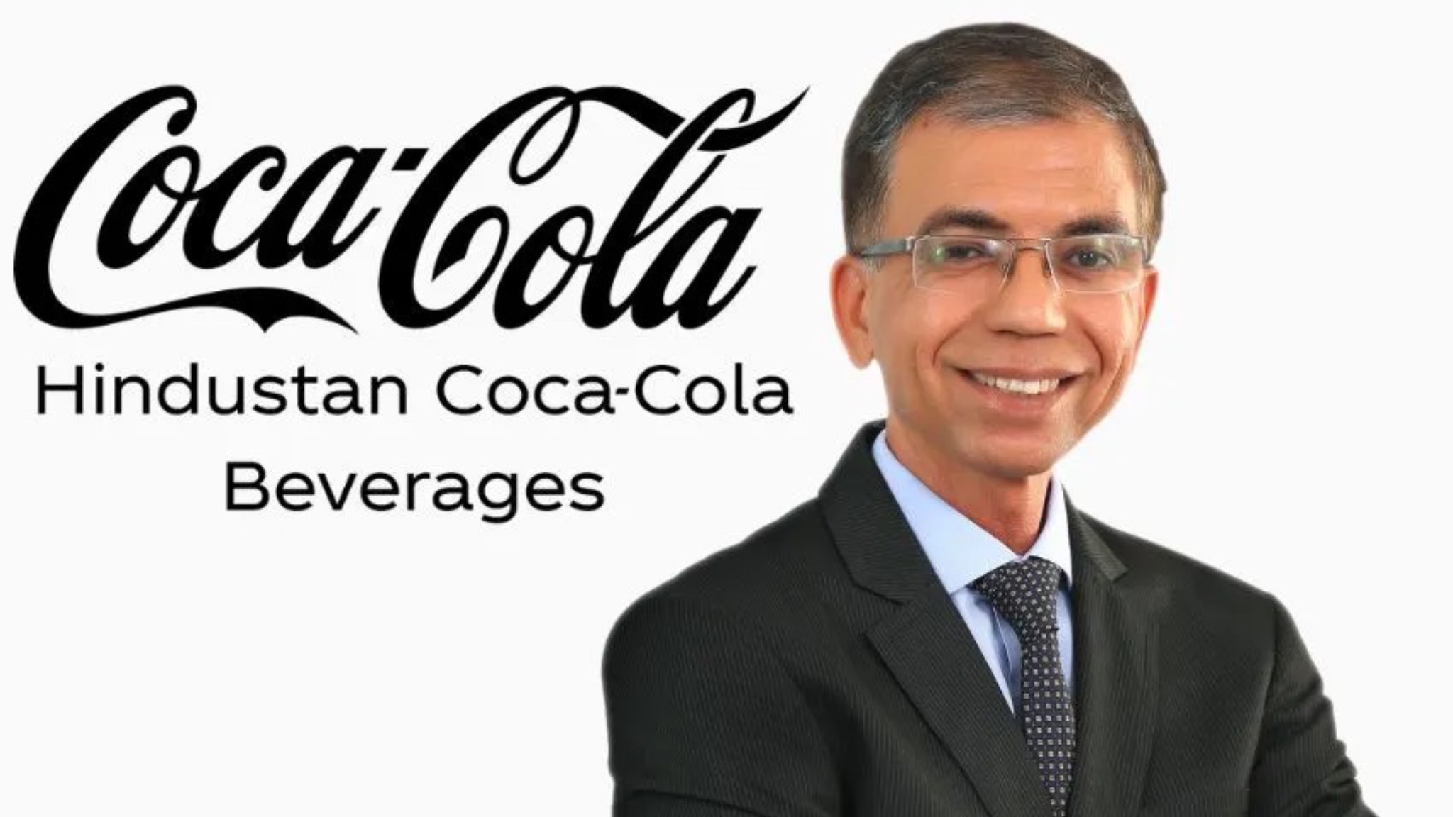 Hemant Rupani, newly appointed CEO of Hindustan Coca-Cola Beverages, smiling in a formal suit